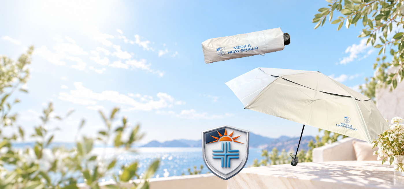 Walking comfortably under a MEDICA-HEAT SHIELD® umbrella on a hot sunny day